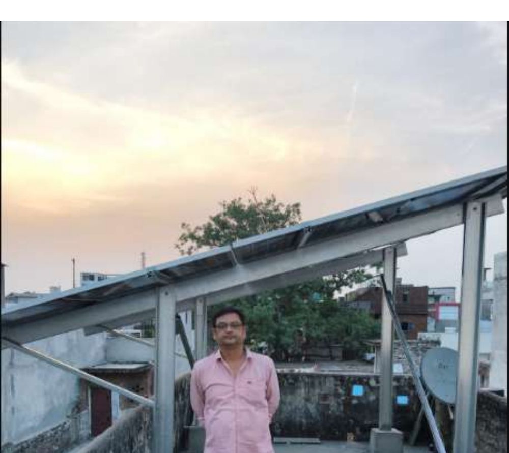 Completed rooftop solar panel installation at a residential property in Aminabad, Lucknow, at dusk